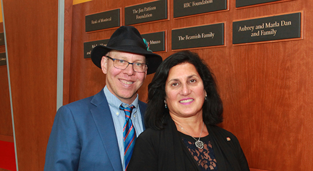 Proud Queen's parents, Aubrey and Marla Dan, are honoured with a named plaque on the donor wall outside Stauffer Library