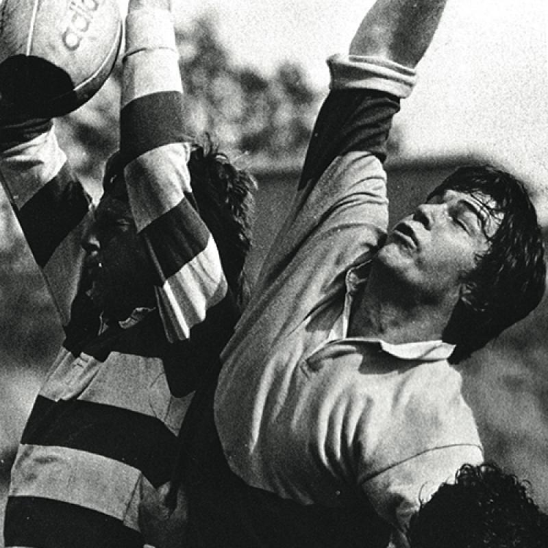 Gord Nixon playing rugby