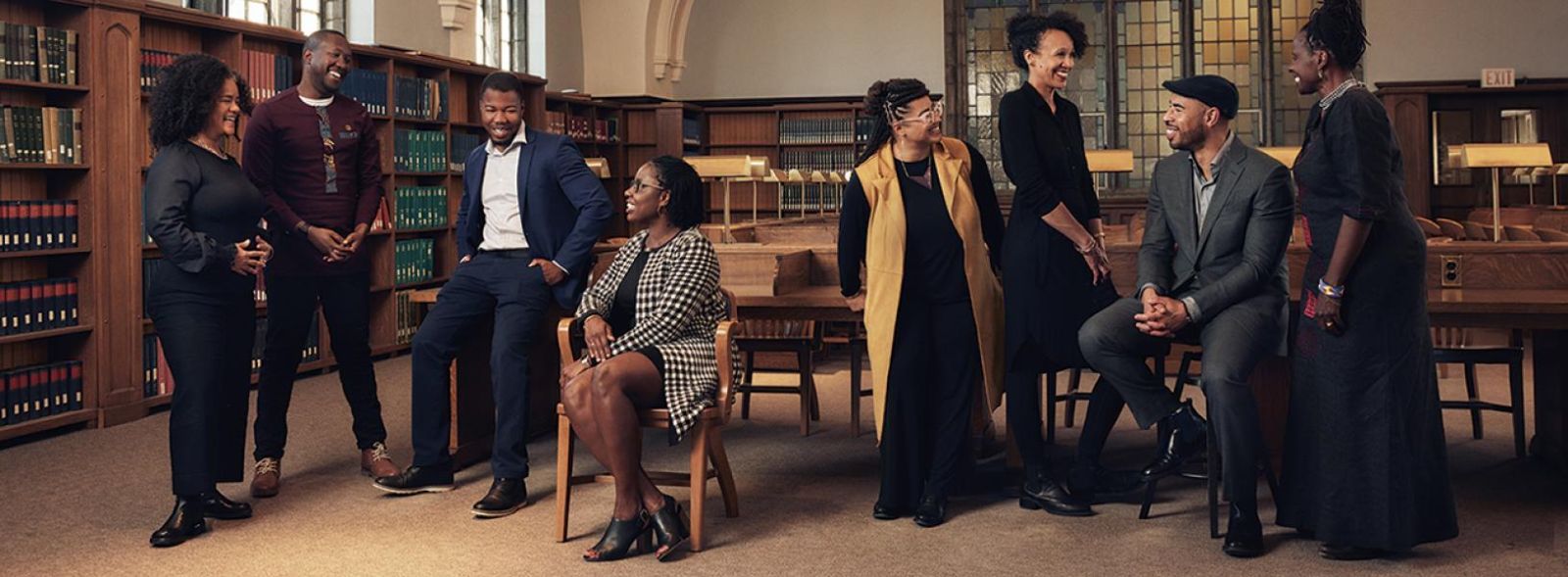 Black Studies professors pose in a library