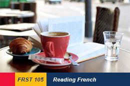 Image of a Breakfast in a Parisian street cafe - cup of coffee, croissant and book