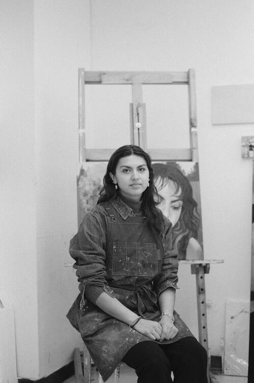 Valerie Camila posing in her studio