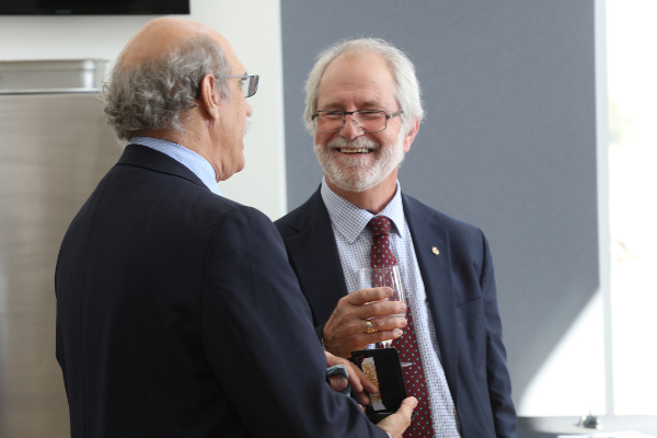 Queen's Principal and Vice-Chancellor Patrick Deane talking with Nobel Laureate Martin Chalfie.