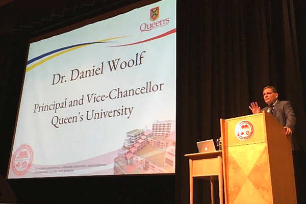 [Principal Woolf gives speech at the Canadian International School (Photo: Liz Gorman)]