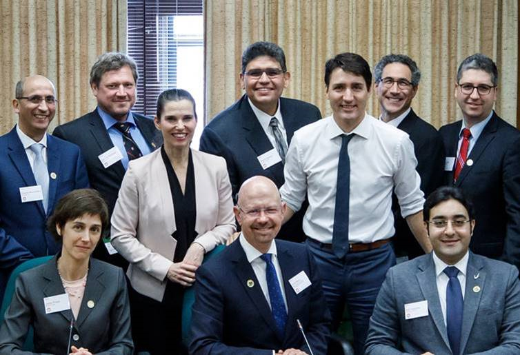 [Ahmed Hassan with Minister Kirsty Duncan and Prime Minister Justin Trudeau]