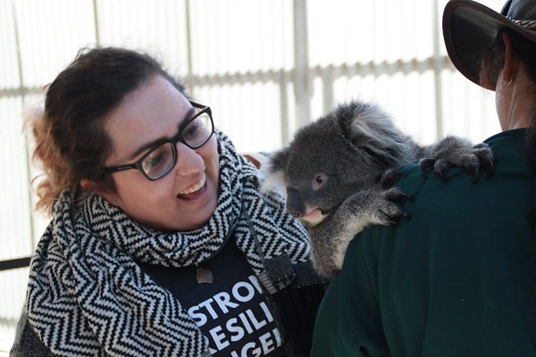 Katrina Brown Akootchook is introduced to local culture hands-on as she meets a koala during the trip to Australia. (Supplied Photo)