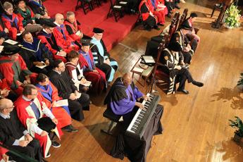 "Internationally-renowned pianist Oliver Jones performs after receiving an honorary degree from Queen's."