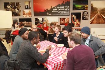 Students enjoy an international supper together.
