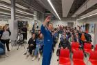 Canadian Space Agency astronaut Joshua Kutryk takes a selfie with Queen's students.