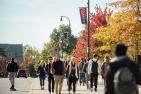 [Students walking along University Avenue]