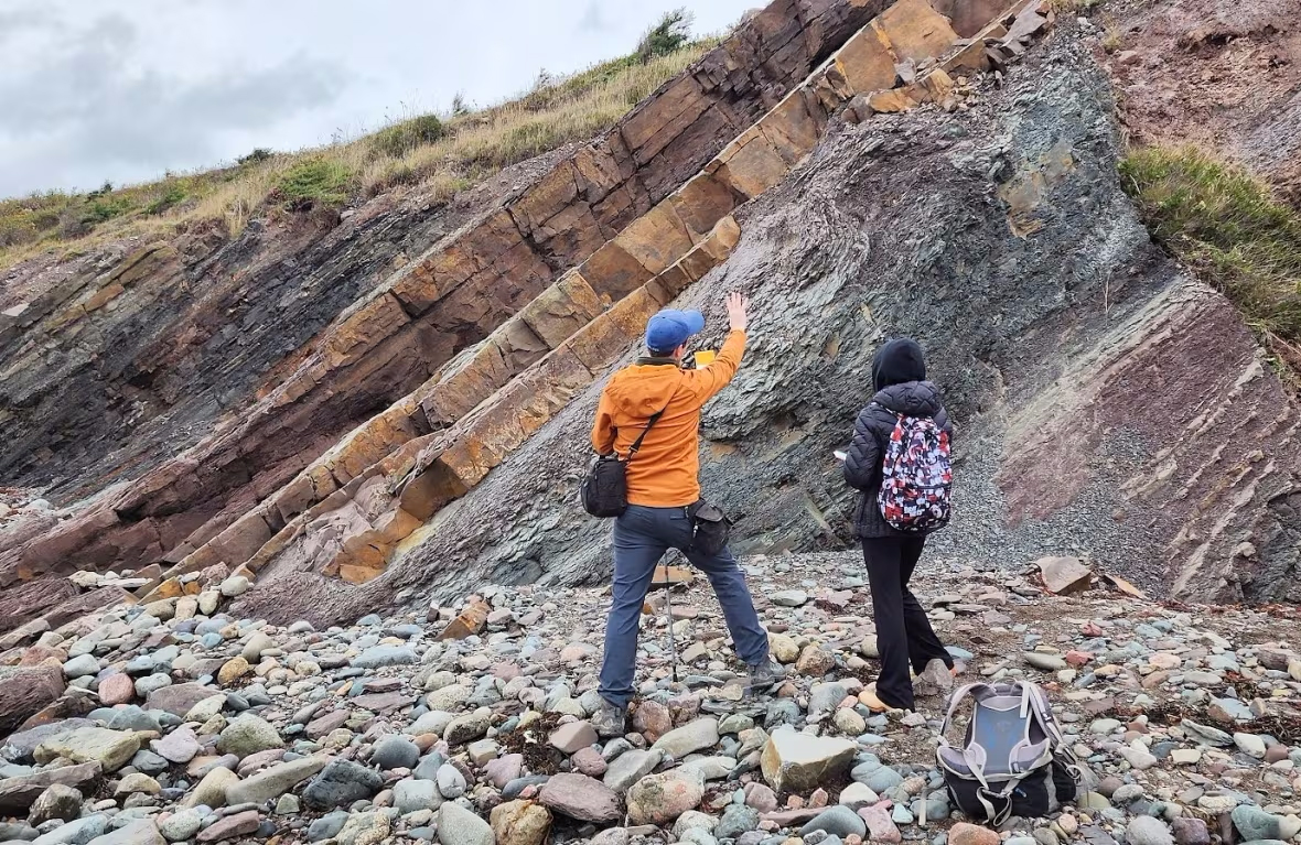  Ted Matheson and student Jessica MacIsaac examine the landscape near Creignish