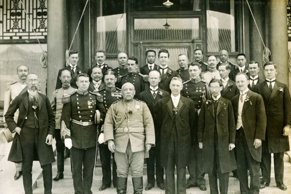 A black and white picture of a group of men in military uniform