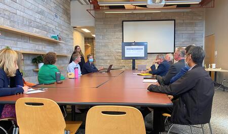 Members of the Kingston-Syracuse Pathway meet for discussions in the Human Mobility Research Lab boardroom