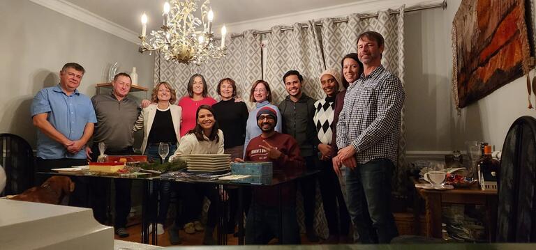 people gathered around the table