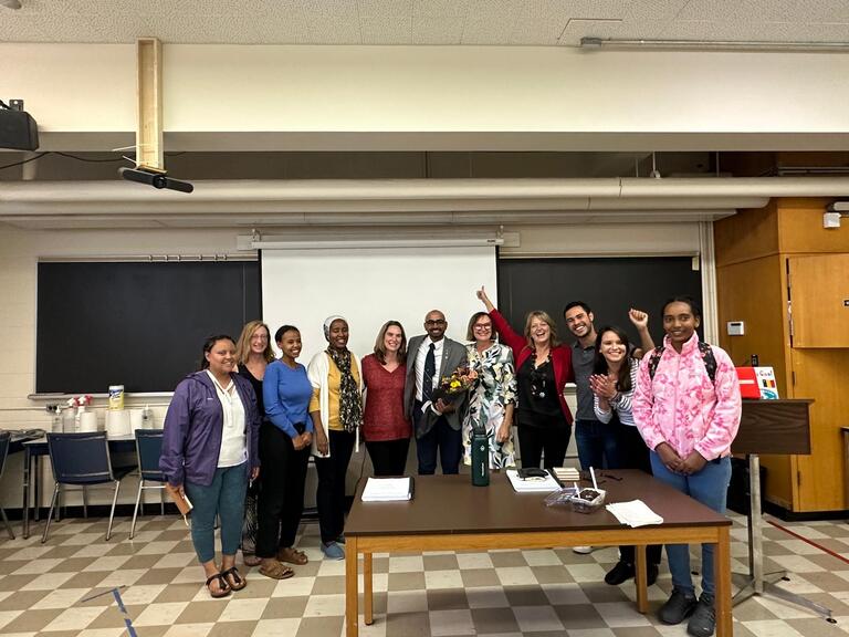 groups of professors and students after the defense