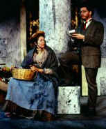 Eliza Doolittle the flower girl in George
 Bernard Shaw's play Pygmalion (popularized as 'My Fair Lady')