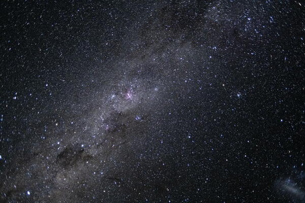 art002e012588 (April 7, 2026) - A stunning snapshot in time. The Artemis II crew captured this breathtaking photo of our galaxy, the Milky Way. The Milky Way’s elegant spiral structure is dominated by just two arms wrapping off the ends of a central bar of stars. Spanning more than 100,000 light-years, Earth is located along one of the galaxy’s spiral arms, about halfway from the center. Credit: NASA Image Credit: NASA