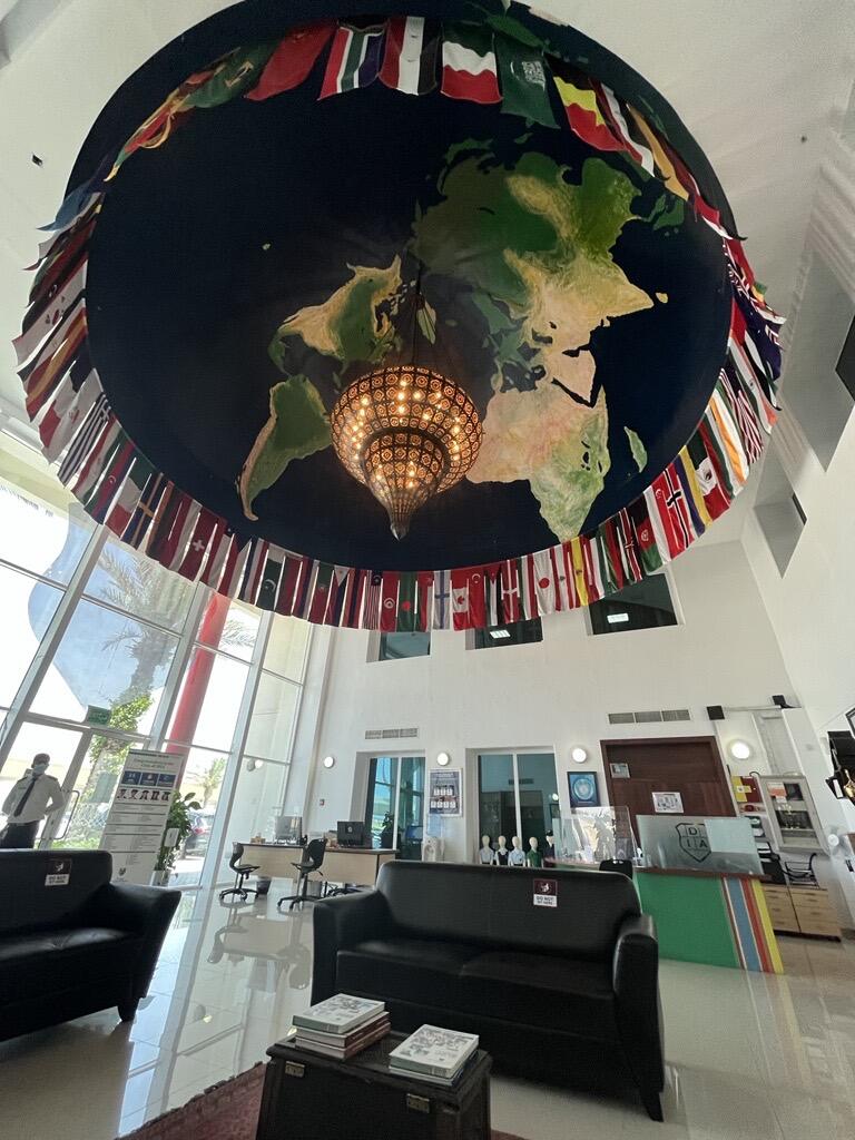 Flags of the world hanging in a room
