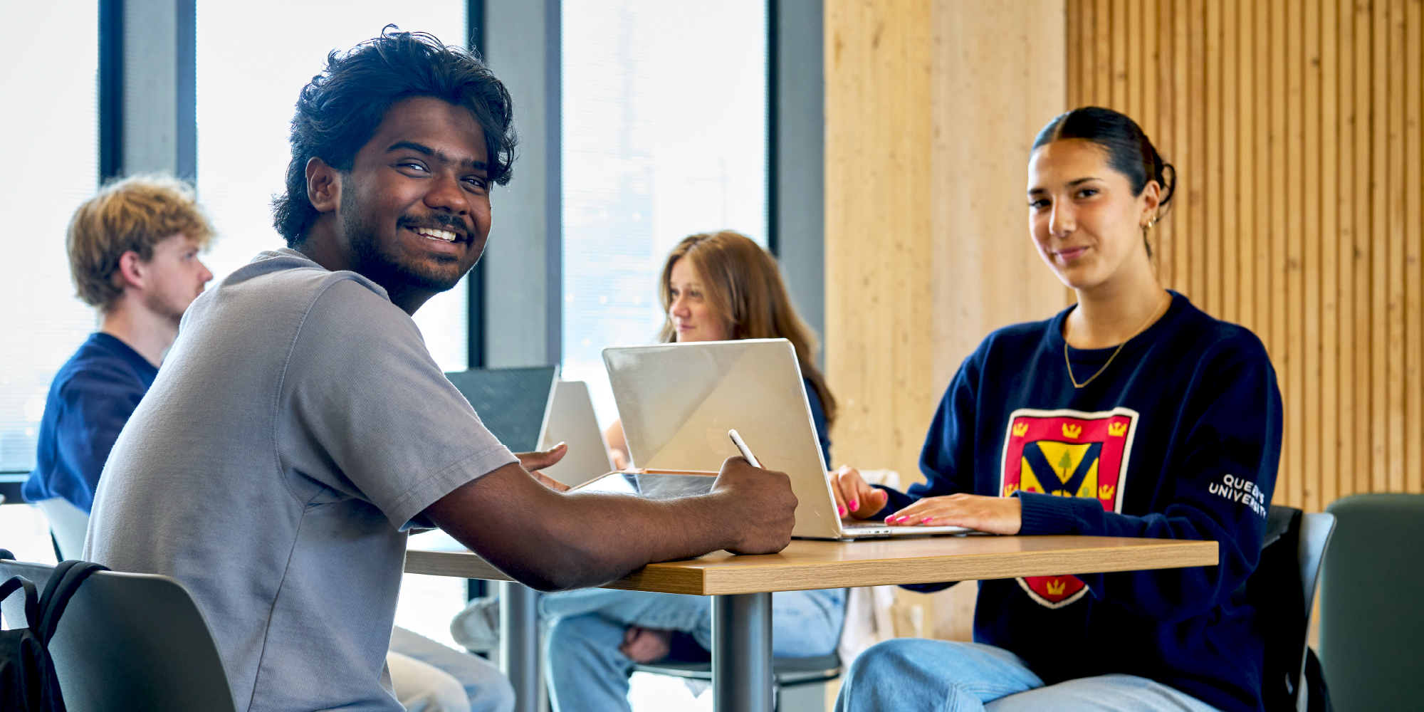 Students sitting at a coffee table 