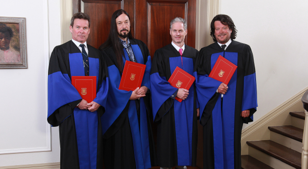 Members of the Tragically Hip receive their honourary degrees