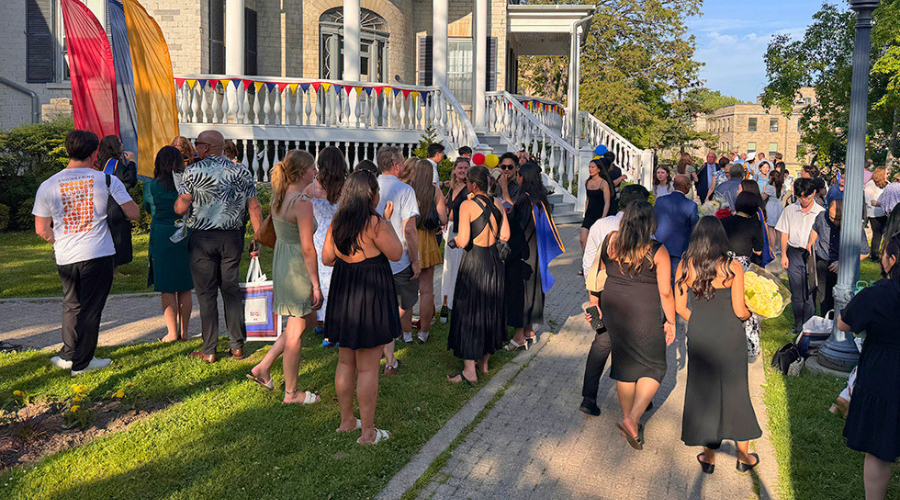 Gathering at Summerhill showcasing graduates and families.