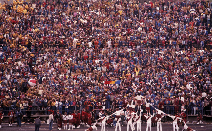Aerial view of Homecoming football game, focusing on the crowd of alumni.