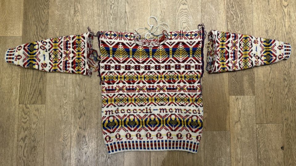 The Thistlewood traditional Fair Isle sweater extended on a flat surface.