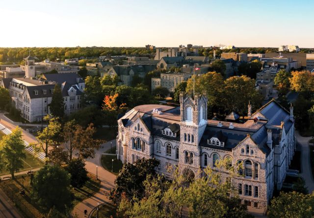 Aerial view of Queen's University featuring its distinctive buildings and vibrant campus atmosphere.