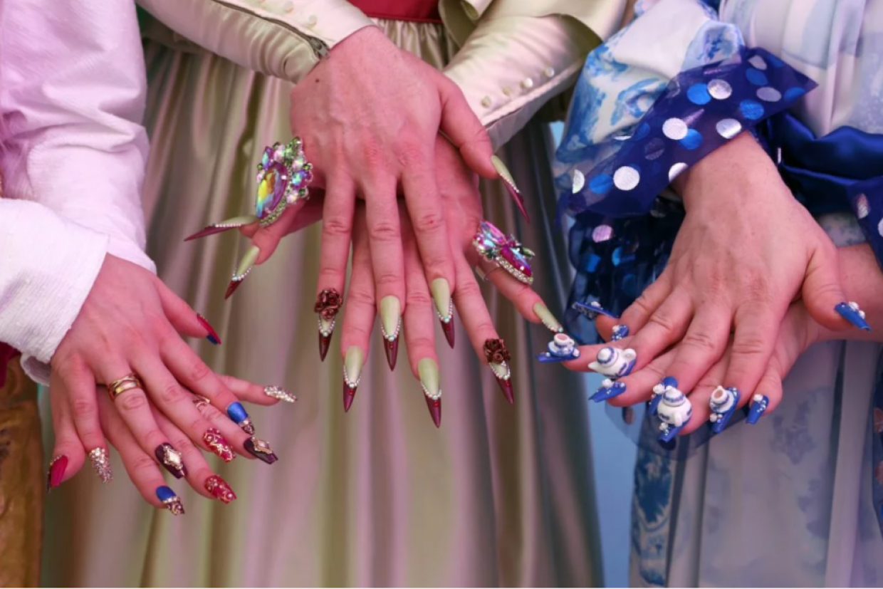 Dare de LaFemme, Rowena Whey and Tyffanie Morgan showcase their nails done by Funeral Face Nails