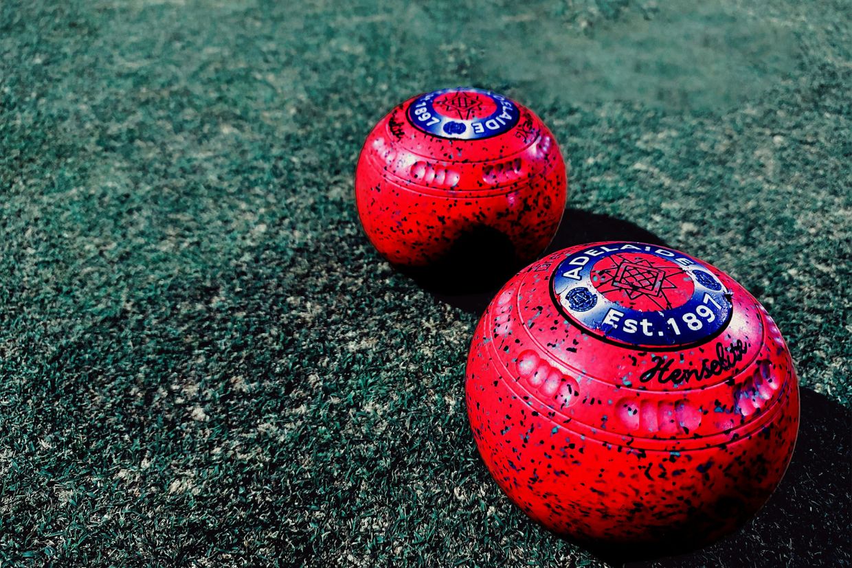 Lawn bowling balls on grass