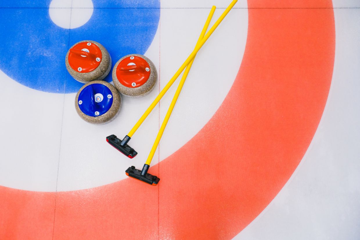Photo of Curling Rocks and Curling Brooms