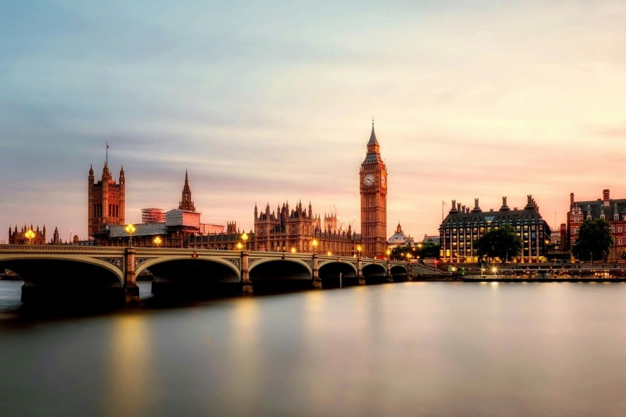 A photo of the London, UK city skyline at dusk