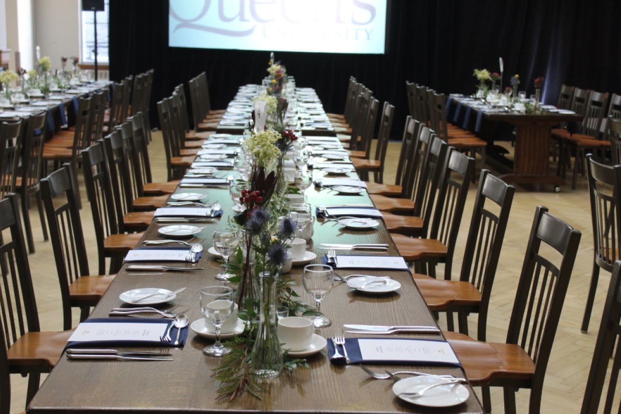 Long dining room table set for a class dinner