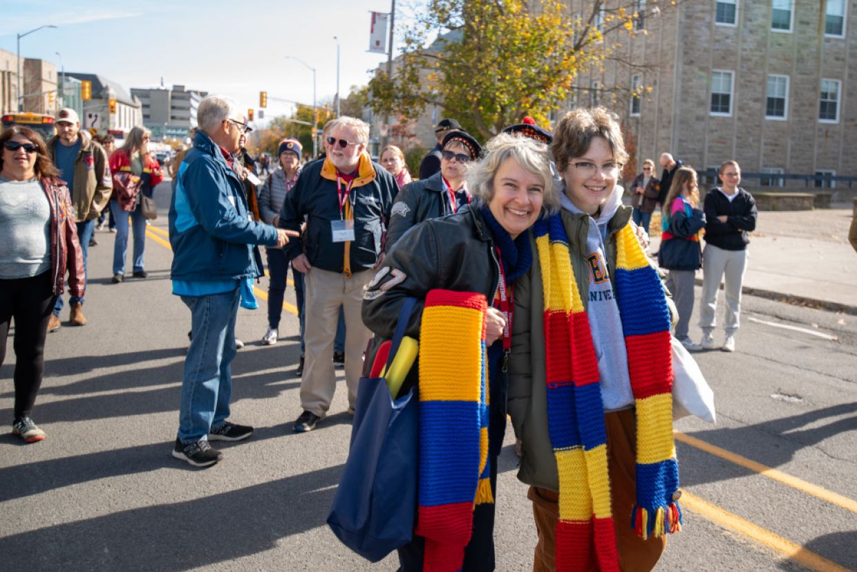 Alumni dressed in tricolour parade down Union Street