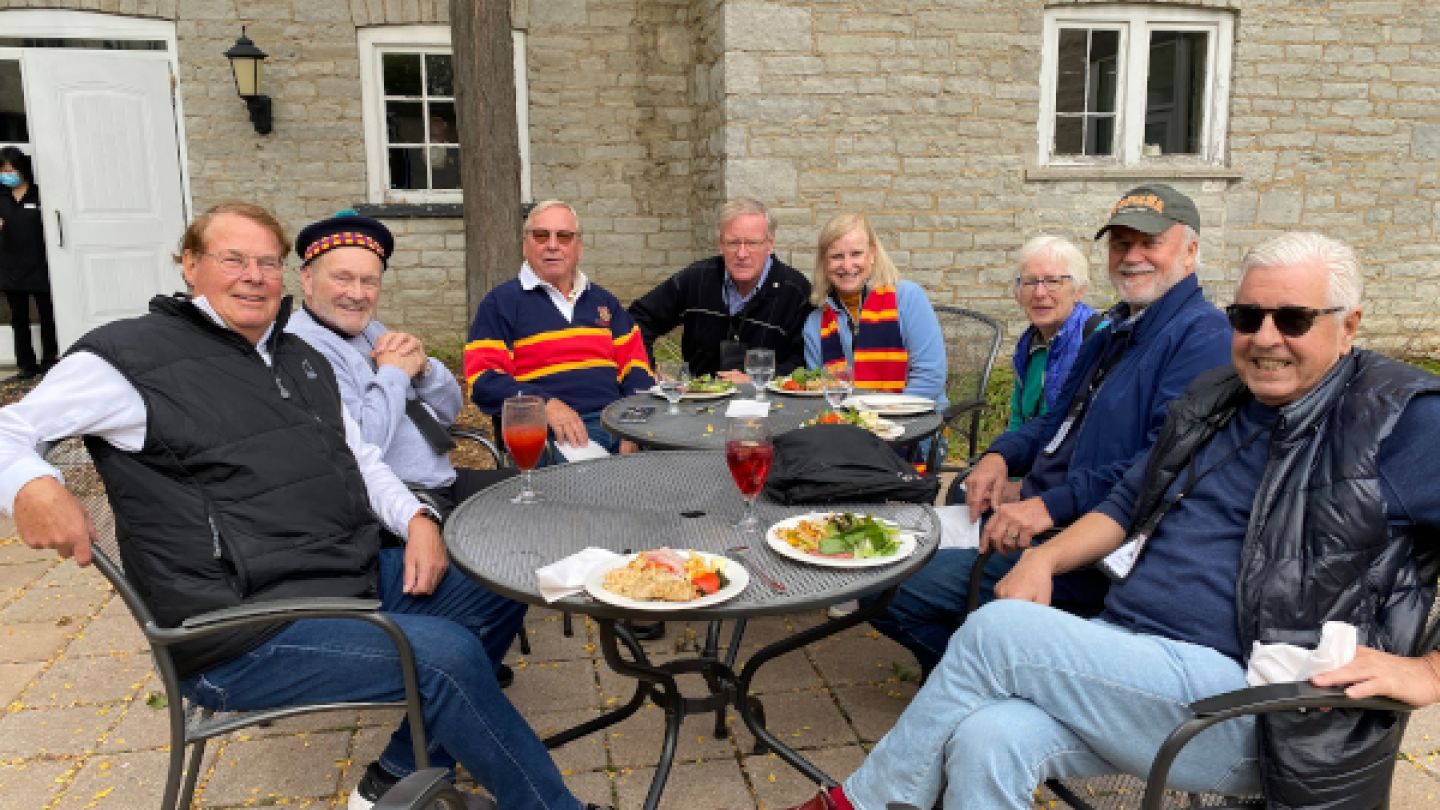 Members of Arts,Com,PHE'71 enjoying a meal together