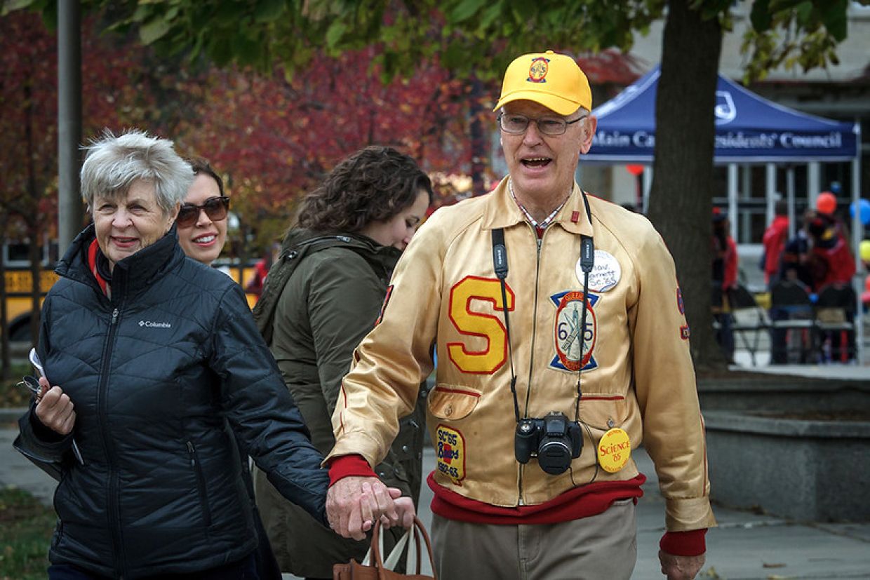 Sc'65 Alumnus walking on campus, 2015