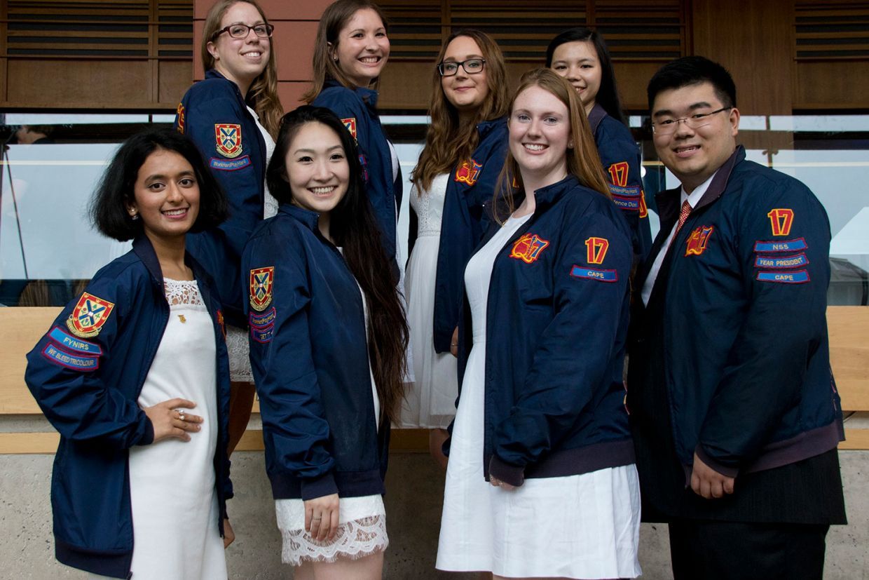 Members of the class of 2017 for the School of Nursing pose for a photo in their class jackets.
