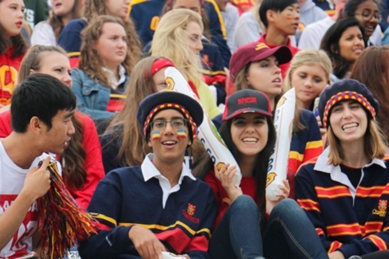 [Students at Homecoming Football Game]
