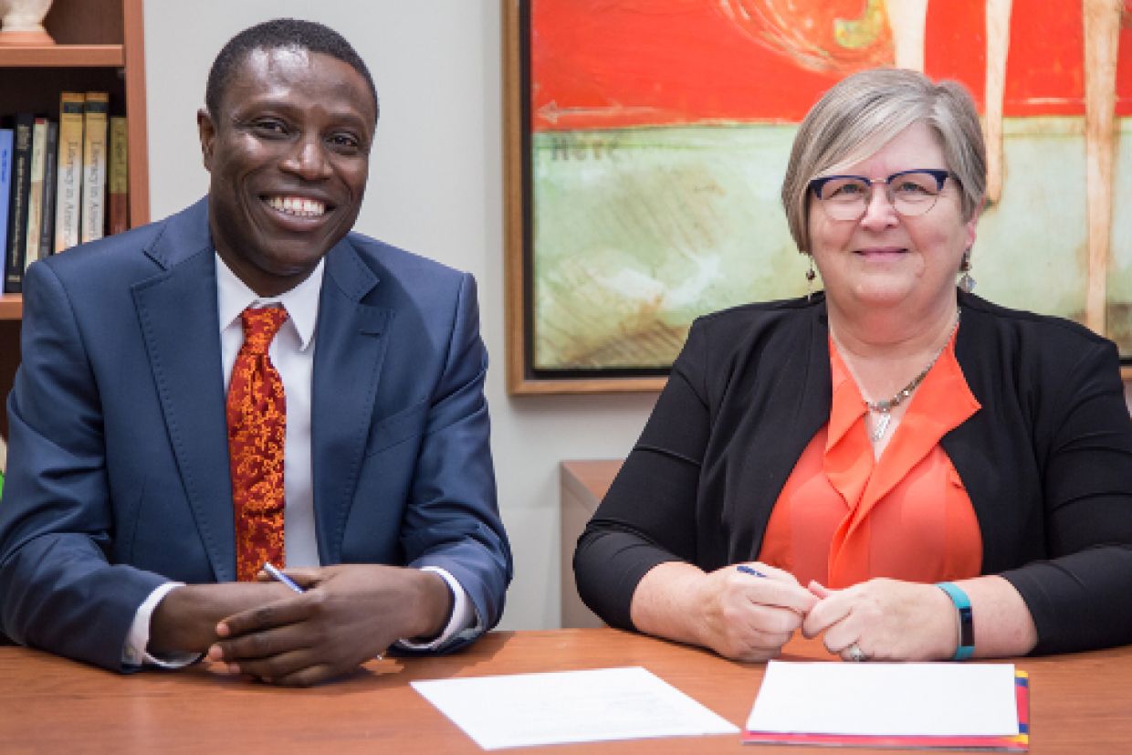 Dean Rebecca Luce-Kapler with Hakeem Subair