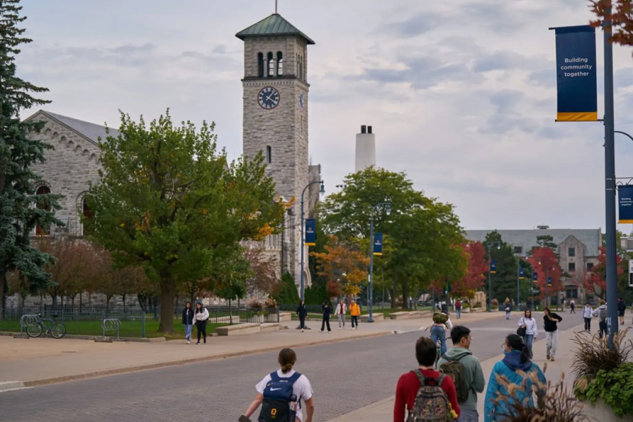Students walking along University Avenue near Grant Hall