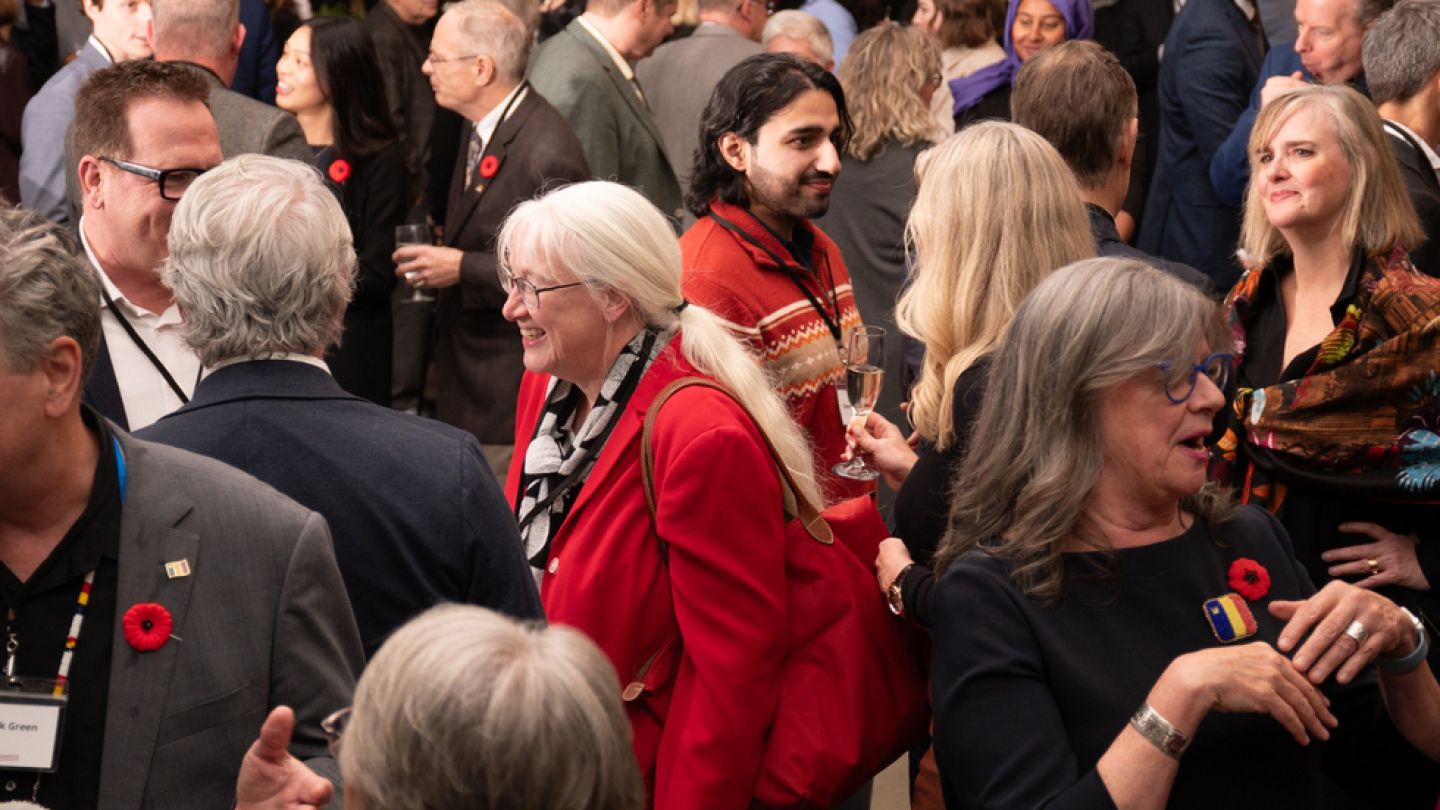Members of the Queen’s community gather for a reception honouring the 2025 recipients of the Distinguished Service Awards at the Isabel Bader Centre for the Performing Arts on Nov. 7, 2025. (Photo: Stephen Wild)