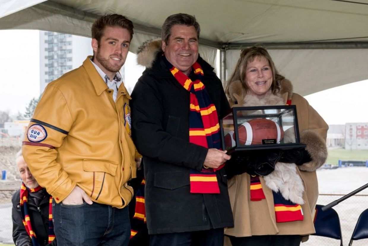 Stu, centre, and Kim Lang, right, at the Richardson Stadium groundbreaking ceremony in 2015.