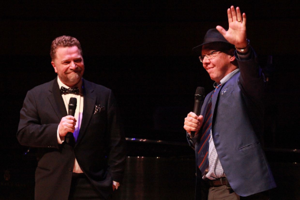 Craig Walker and Aubrey Dan banter on stage at the unveiling event for the Dan School of Drama and Music at the Isabel.