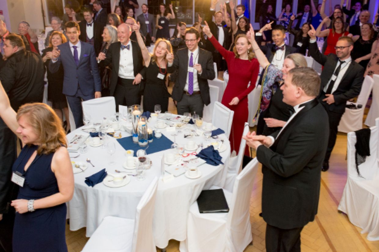 Gala attendees sing the Oil Thigh