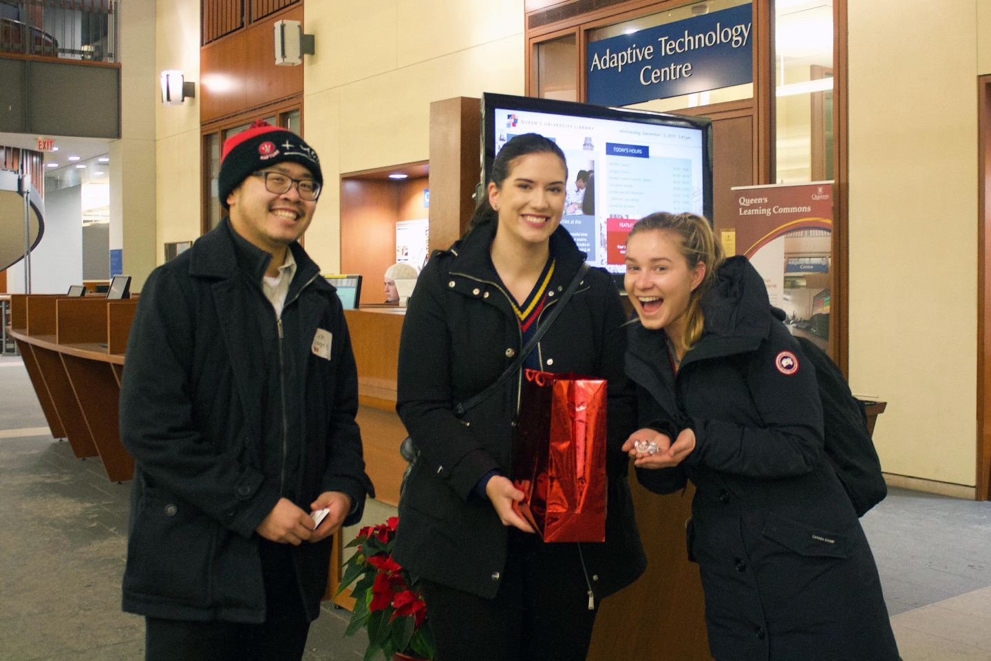 Alumni deliver candy to students during exams