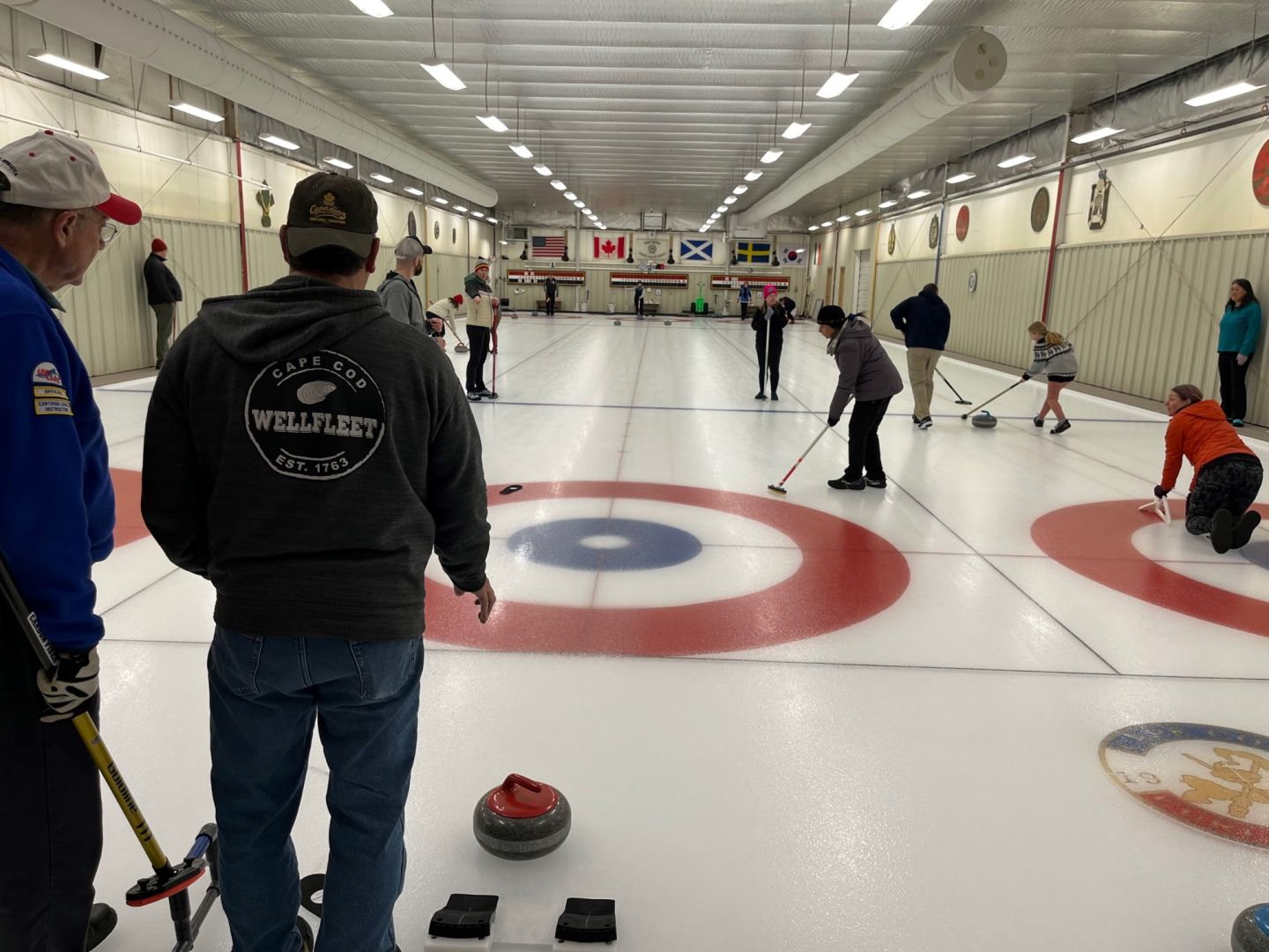 Alumni playing a game of curling.