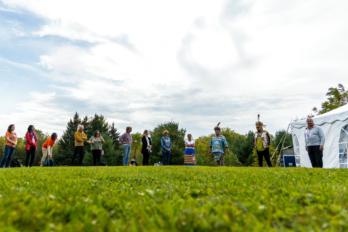 Mile in Their Shoes participants with Indigenous guides and Knowledge Keepers at in-person day in 2023