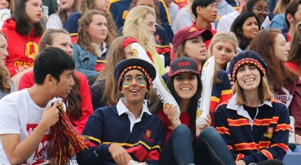 [Students at Homecoming Football Game]