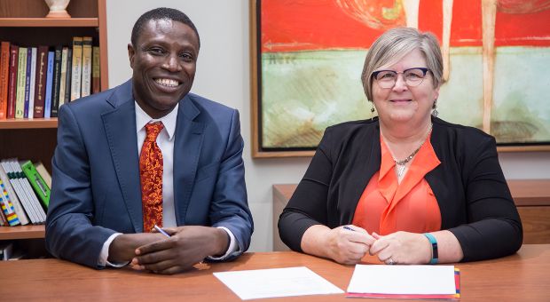 Dean Rebecca Luce-Kapler with Hakeem Subair