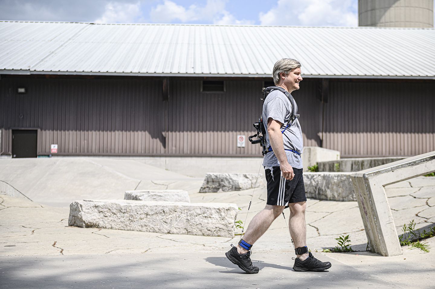 Senior Research and Development Engineer Michael Shepertycky, Sc’11, MASc’13, PhD’21, wearing one of his patented exoskeletons.