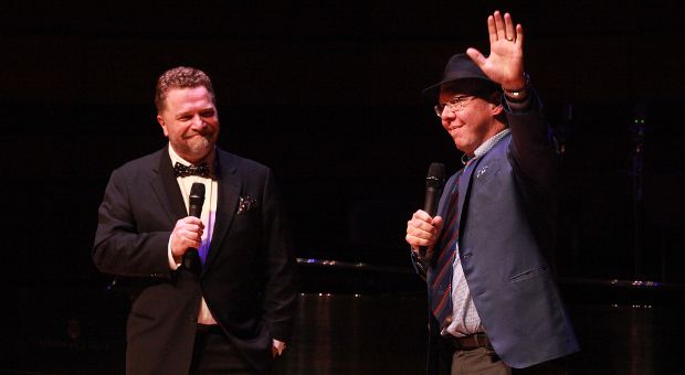 Craig Walker and Aubrey Dan banter on stage at the unveiling event for the Dan School of Drama and Music at the Isabel.